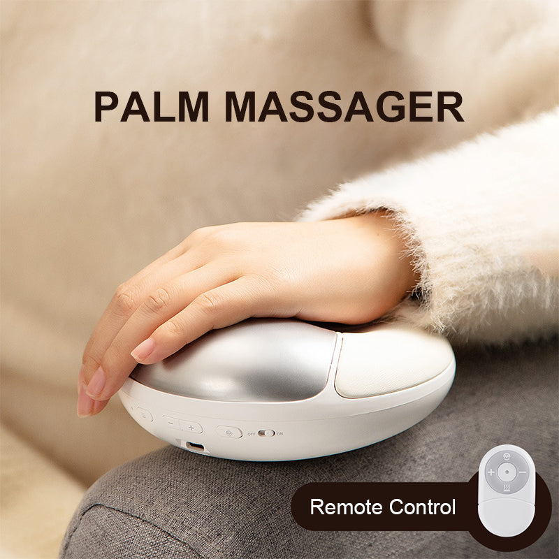 Heated palm massager with hand resting on the dome