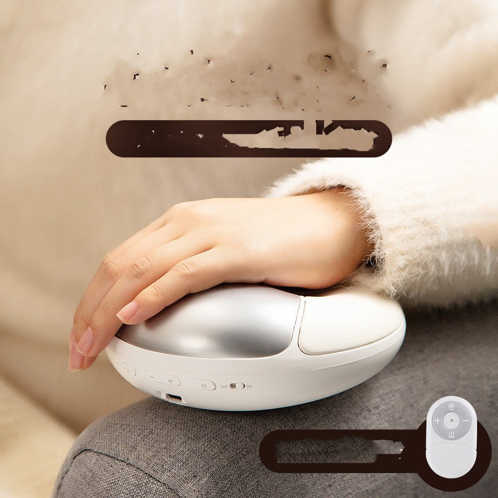 Heated palm massager in use on a desk