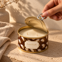 Opening the ring-pull lid of a tin scented candle