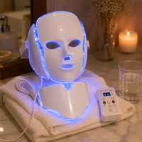 LED face and neck mask with handheld controller